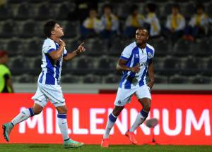 Porto's Colombian midfielder Juan Quintero (L) celebrates after scoring the opening goal during the Portuguese Liga football match FC Arouca vs FC Porto at Arouca city stadium in Arouca on October 25, 2014. AFP PHOTO/ FRANCISCO LEONG        (Photo credit should read FRANCISCO LEONG/AFP/Getty Images)