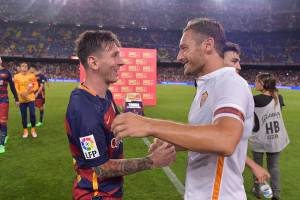 Messi e Totti (Getty Images)