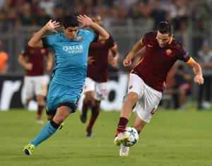 Suarez e Manolas (Getty Images)